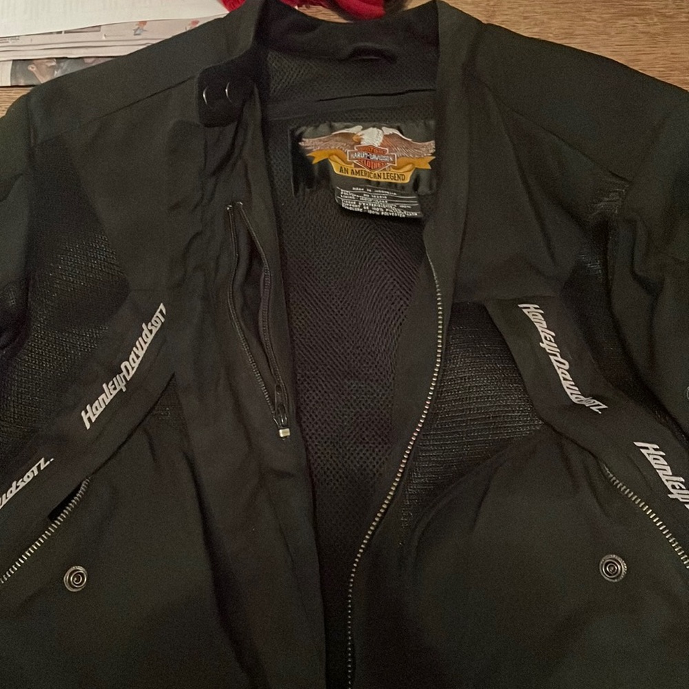 Medium mens Nylon Harley Davidson motorcycle jacket.
